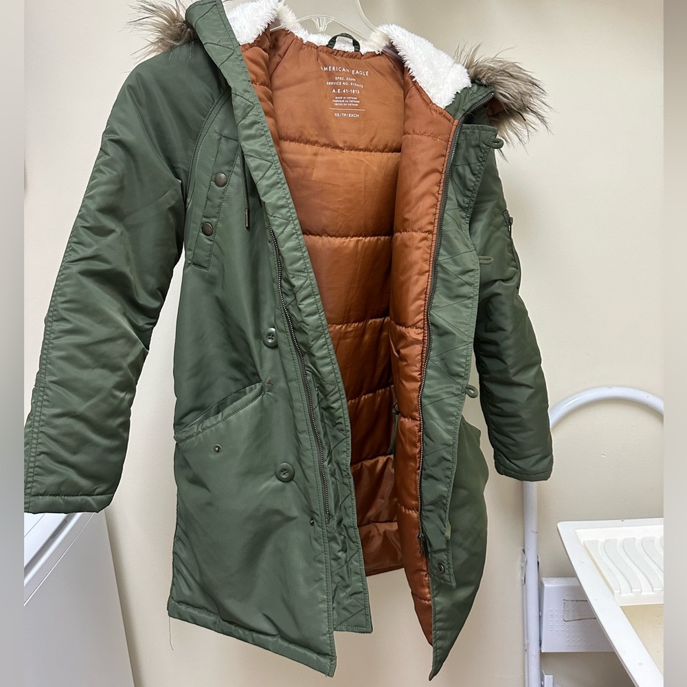 American Eagle long puffer coat with fur and fleece lined hood.
